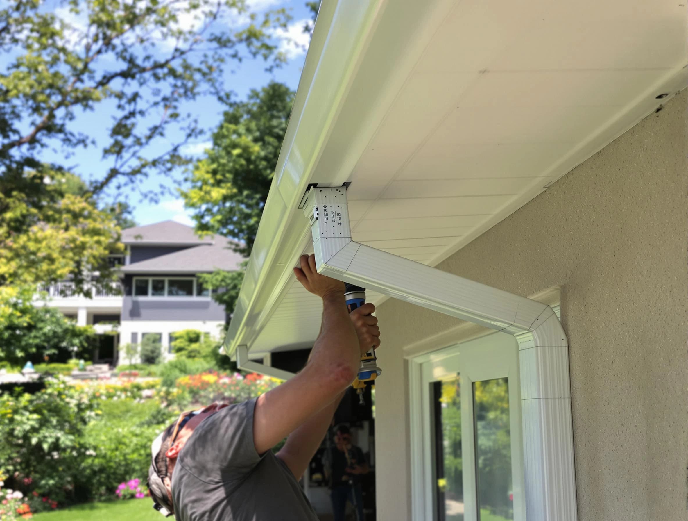 Twinsburg Roofing Company technicians performing gutter installation in Twinsburg, OH